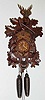  C.1995 German "Regula", 30-hour time/strike cuckoo clock, hunting motif with crossed rifles at top, deer head, rabbit and bird.. 