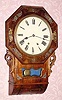  C.1890, German, 8-day time and strike wall clock, wooden plates. 