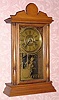  C.1910, Sessions Clock Co., Forestville, Conn, "EIFFIEL" , poplar cased mantel clock, 8-day time and gong strike plus alarm. 