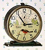  C.1933, Westclox, LaSalle, Ill, "Early Bird", 30-hour novelty alarm timepiece, Rocking robin is pulling a worm from the earth.