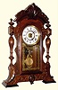  C.1875, F. Kroeber, NY, "MARIPOSA", walnut and burled veneer parlor clock, 8-day time, strike and alarm. 