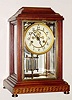  C.1913, Waterbury Clock Co., Waterbury, Conn, CHER , crystal regulator, inlaid mahogany case, with faux mercury pendulum. 