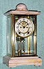  C.1914, Ansonia Clock Co., NY, CHANCELLOR, Crystal Regulator, with white onyx top and base, and with original faux mercury pendulum 