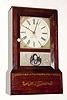  C.1850, Upson/ Brown 8-day cottage clock in a rosewood case with original stenciling intact, original Brewster and Ingrahams movement. 