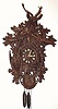  C.1930, German, A. Hummel, Villingen, (signed) Large 3-note Wall Trumpeter, in a carved case with hunter motif. 