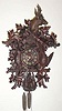  C.1915, German, Large Cuckoo clock, Hunting motif , with side carving of deer's head, rabbit pheasant and profuse oak leaves and acorns. 