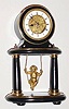  C.1880, French, Farcot, Swinging Doll timepiece, in a black marble case with brass trim, unusual oval portico design. 