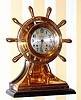  C.1924, Chelsea Clock Co., Boston, Mass., "Mariner" , 8-day ship's bell clock serial number 161273 in a polished red brass case, 4.5" dial, with a Chelsea winding key. This model was originally identified as "The Yacht Wheel with base", but in 1928 the name was changed to the Mariner. 