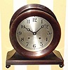  C.1951, Chelsea Clock Co., Boston, Mass., "Base and Ball" , 8-day ship's bell clock, 6" dial, serial number 567253 in a bronze finish case retailed by "J. E. Caldwell and Co" (on dial). This model was also known as the "Commodore" and the "Constitution" over the years. 