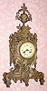  C.1890 French, 8-day time/strike rococo style mantel clock in brass. Bell strike movement by Japy. 