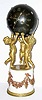  C.1880 French, Japy Freres, 8-day time/strike "Three Cherubs" mantel clock retailed by Tiffany and Co., New York, the movement contained within a star studded globe. 