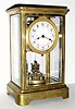  C.1906, German, Philip Haas, Plate 1043, 400-day torsion pendulum timepiece in a brass and glass crystal regulator case with original disc pendulum. 