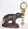  C.1910, German, Junghans, 8-Day Elephant swing clock, the clock arm supported by a jewel bar that extends from the tip of the elephants trunk. 