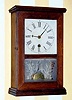  C.1855, Silas B. Terry, Terryville, Conn., 30-hour cottage timepiece with a ladder type movement with the spring outside the back plate.