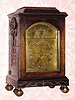  Late 18th century, English, Small Crown Verge, 2-fusee, Quarter Striking bracket clock, with a later C.1900 brass dial with block letters stating "RIMBAULT, LONDON", and with animation in the arch. 