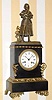  C.1840, French, Joan of Arc, marble and bronze figural clock, with 8-day silk thread, bell strike movement. [Joan of Arc, 1412-31 was instrumental in rallying the French in their fight against the English during the 100 years war] 