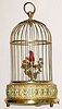  C.1955, German, Singing Bird in Cage, bird with red feathers, bottom wind, with start/stop lever; bird turns and flutters when singing. 