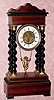  C.1870, Japy Fils (1855 Award Medallion), SWINGING DOLL , in an Empire style case with 4 barley twist columns, striking. 