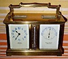  C.1905, French for the English Market, brass cased carriage "Weather Station", the clock to the left and Aneroid barometer to the right, and with thermometer in the center. 