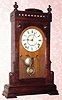  C.1884, Seth Thomas Clock Co., Thomaston, Conn, "BOSTON, V.P." , walnut cased parlor clock from the City series, 8-day time and bell strike. 