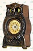  C.1900, German, Junghans, Animated "OWL" Timepiece (eyes cross and uncross), one day duration, wooden case box with cast metal owl body attached at front. 