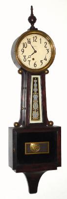 C.1915, E. Ingraham and Co., "NYANZA", spring banjo, 8-day time only in a mahogany case. — Antique Clocks Price Guide