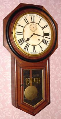C.1901, Ansonia Clock Co., "Regulator A", 8-day time/strike long drop octagon school clock. — Antique Clocks Price Guide