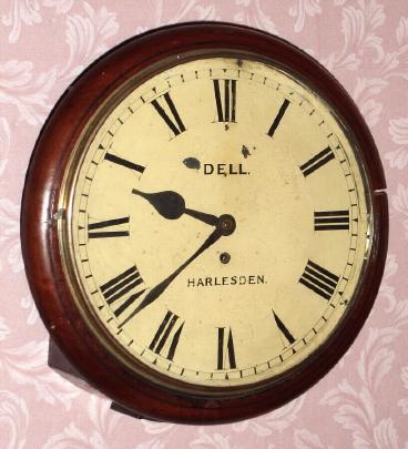 C.1920, English, Dial or postal clock, 8-day, fusee. — Antique Clocks Price Guide