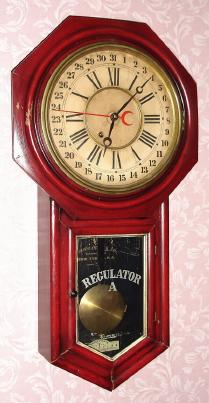 C.1901, Ansonia Clock Co., REGULATOR A - CALENDAR, as-found, now absent veneer and painted red and with grained over-coat. — Antique Clocks Price Guide