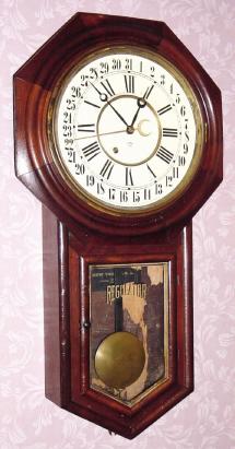 C.1901, Ansonia Clock Co., "Regulator A - Calendar", 8-day wall timepiece. — Antique Clocks Price Guide