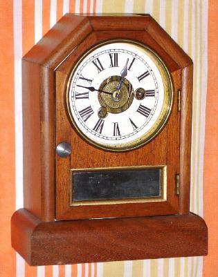 C.1880, Seth Thomas Clock Co., "Octagon Top E", 30-hour walnut cottage timepiece, with alarm. — Antique Clocks Price Guide