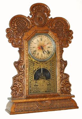 C.1924, E. Ingraham and Co., "Gila", 8-day time and gong strike calendar kitchen clock. — Antique Clocks Price Guide
