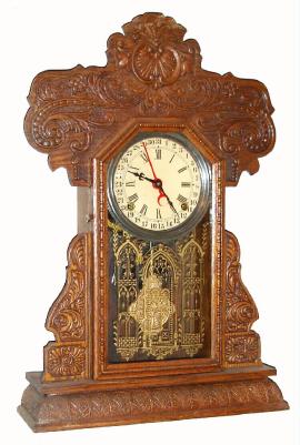 C.1907, E. Ingraham and Co., "Aurora", 8-day time, strike + calendar kitchen clock, in a deeply pressed oak case. — Antique Clocks Price Guide