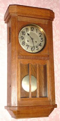 C.1920, German, Junghans, 8-day time and gong strike, oak cased wall clock. — Antique Clocks Price Guide