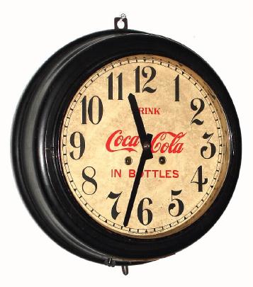 C.1950, Asian gallery clock, 8-day time and gong strike, pendulum driven, with later Coke advertising. — Antique Clocks Price Guide