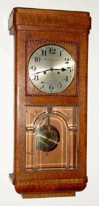 C.1910, German, Gustav Becker, 8-day time and strike Box style wall clock, broken glass. — Antique Clocks Price Guide