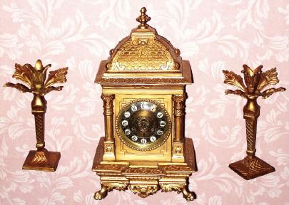C.1890, French, 8-day time and bell strike three piece garniture set, with restorations. — Antique Clocks Price Guide