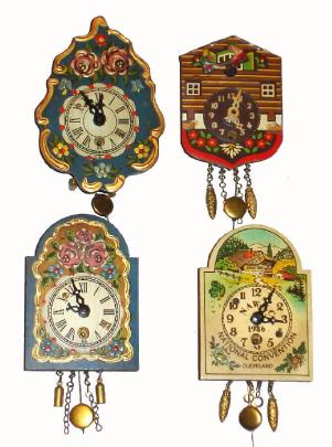 Lot of 4: C.1986 German, 30-hour miniature hanging novelty timepieces. — Antique Clocks Price Guide