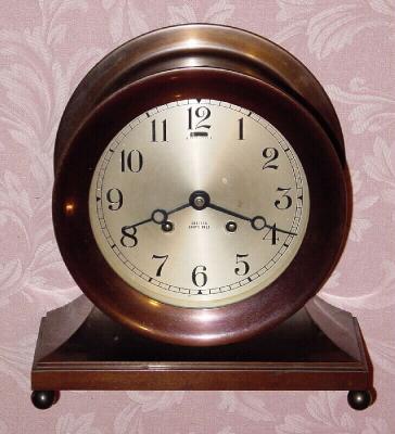 C.1948, Chelsea Clock Co., Base and Ball, Ship's Bell table clock with original bronze finish, 6" dial. — Antique Clocks Price Guide
