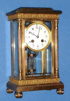 C.1895, French for Tiffany and Co., 8-day time/strike crystal regulator, with fluted Corinthian columns and case brass trim. — Antique Clocks Price Guide