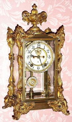 C.1904, Ansonia Clock Co., MARCHIONESS, fancy 4-glass crystal regulator, fitted with "brilliant" sash and pendulum. — Antique Clocks Price Guide