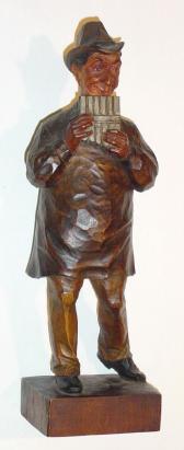 C.1930, German, Karl Griesbaum, mechanical whistling Man with Pan Flute, key wound from the rear. — Antique Clocks Price Guide
