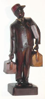 C.1920, German, Karl Griesbaum, mechanical whistling Black Porter with Red Hat and Luggage, key wound. — Antique Clocks Price Guide