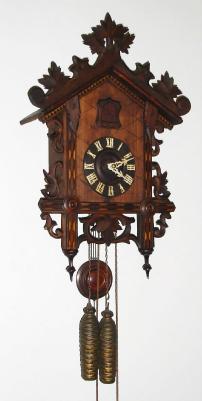 C.1910, American Cuckoo Clock Co., Philadelphia, 30-hour, 2-weight, time and strike cuckoo clock. — Antique Clocks Price Guide