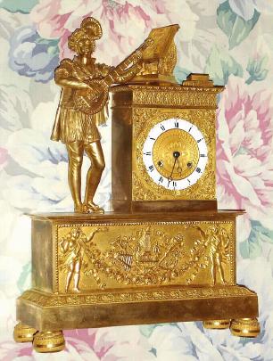 C.1840, French, Ormolu Figural clock, a mandolin player, and an engraved tribute to H. Barbie a 19th Century musician (and a reference to Rossini). — Antique Clocks Price Guide