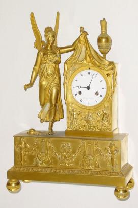 C.1830, French, Chatourel a'Paris, Ormolu figural clock, a winged goddess raising the cloak of darkness to reveal the time. — Antique Clocks Price Guide