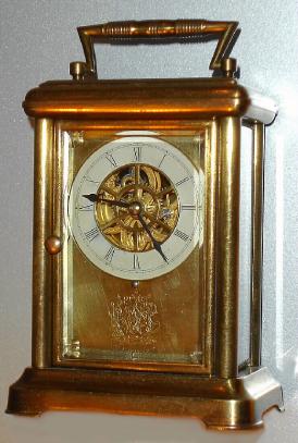 C.1885, Waterbury Watch Co. (yes), rare mini skeletonized dial, carriage timepiece, with rotary regulator (tourbillion), 8-day. — Antique Clocks Price Guide
