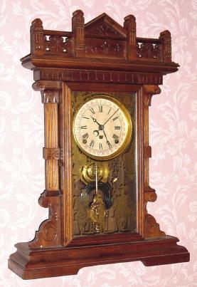 C.1884, FRANKLIN MORSE, Chicago, PATENT PERPETUAL calendar clock, 8-day, time and strike, with an aperture in the dial for the month, and the date shown outside the time track. — Antique Clocks Price Guide