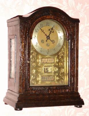 C.1890, German, 8-day time and gong strike, full calendar mantel clock. — Antique Clocks Price Guide