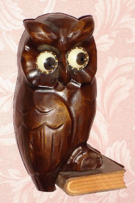 C.1930, German, Oswald, WISE OLD OWL, rotating eye timepiece , molded composition body on a carved wooden book base. — Antique Clocks Price Guide